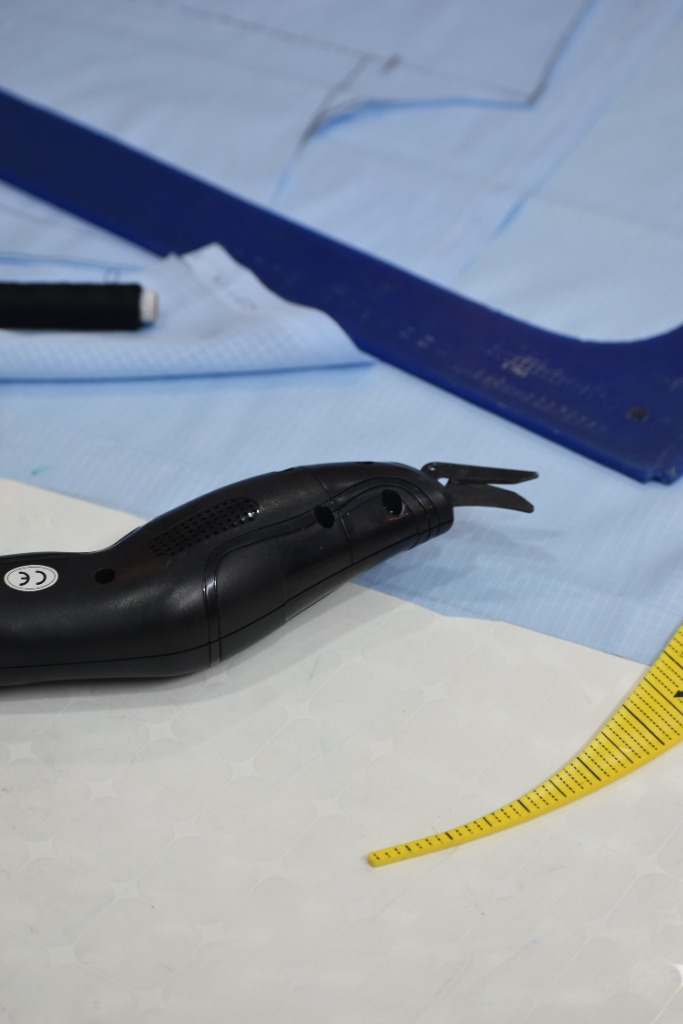 Precision bespoke cutting workbench, tailor square ruler, and pattern drafting at Jay Tailors
